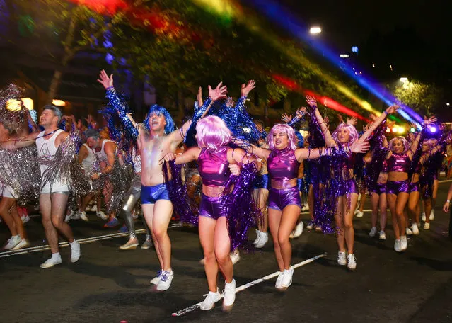 Parade goers dance during the 2017 Sydney Gay & Lesbian Mardi Gras Parade on March 4, 2017 in Sydney, Australia. (Photo by Brendon Thorne/Getty Images)