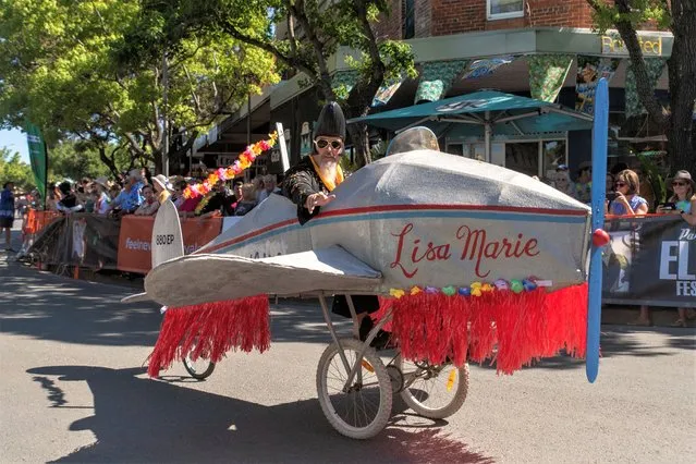 A man wearing an Elvis Presley-inspired outfit participate in the Parkes Elvis Festival parade in Parkes, Australia on January 7, 2023. (Photo by Cordelia Hsu/Reuters)