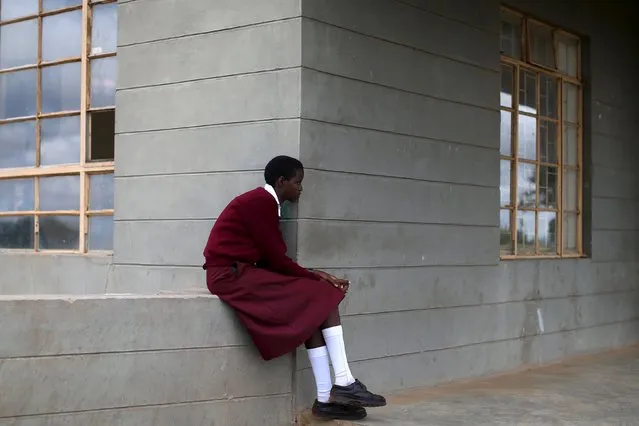 A student awaits for the start of a social event advocating against harmful practices such as Female Genital Mutilation (FGM) at the Imbirikani Girls High School in Imbirikani, Kenya, April 21, 2016. (Photo by Siegfried Modola/Reuters)