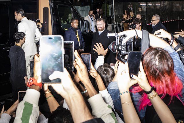 English singer-songwriter Sam Smith heads toward his limousine outside The Mark Hotel on his way to The Met Gala in New York, N.Y., on May 6, 2024. (Photo by Bryan Anselm For The Washington Post)