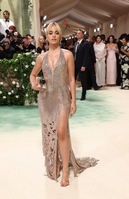 American singer-songwriter Camilla Cabello poses at the Met Gala, an annual fundraising gala held for the benefit of the Metropolitan Museum of Art's Costume Institute with this year's theme “Sleeping Beauties: Reawakening Fashion” in New York City, New York, U.S., May 6, 2024. (Photo by Andrew Kelly/Reuters)