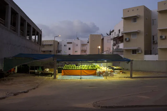 In this Tuesday, June 23, 2015, photo, an Israeli vendor waits for clients at the southern Israeli town of Sderot, next to the Israel-Gaza border. (Photo by Oded Balilty/AP Photo)