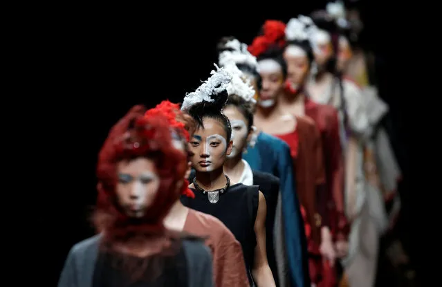 Models present creations by Tibetan designer AJ Namo at China Fashion Week in Beijing, China March 30, 2017. (Photo by Jason Lee/Reuters)