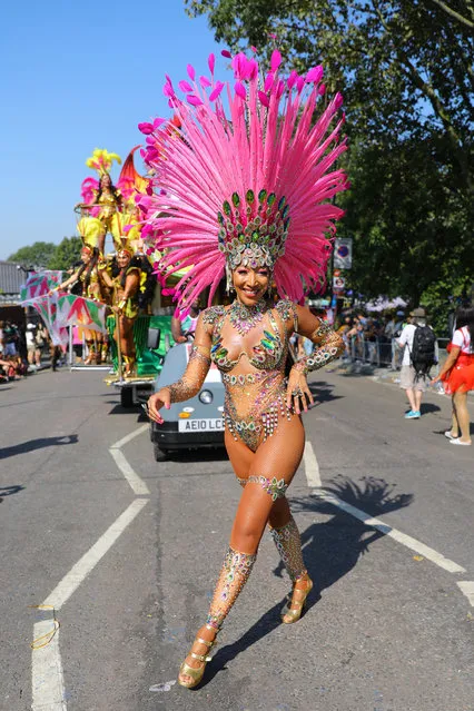 Dancers at the Notting Hill Carnival Adults Parade in London, Britain, 26 August 2019. (Photo by Vickie Flores/EPA/EFE)