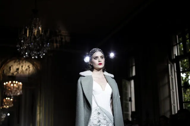 A model wears a creation for Ulyana Sergeenko's fall-winter 2015/2016 Haute Couture fashion collection presented in Paris, France, Sunday, July 5, 2015. (Photo by Thibault Camus/AP Photo)