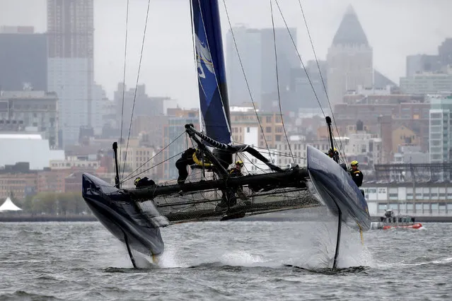 AC45F racing sailboat Artemis Racing comes out of the water as they make a turn during practice racing ahead of the America's Cup World Series sailing event in New York, May 6, 2016. (Photo by Mike Segar/Reuters)