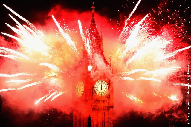 Fireworks light up the London skyline and Big Ben just after midnight on January 1, 2012 in London, England