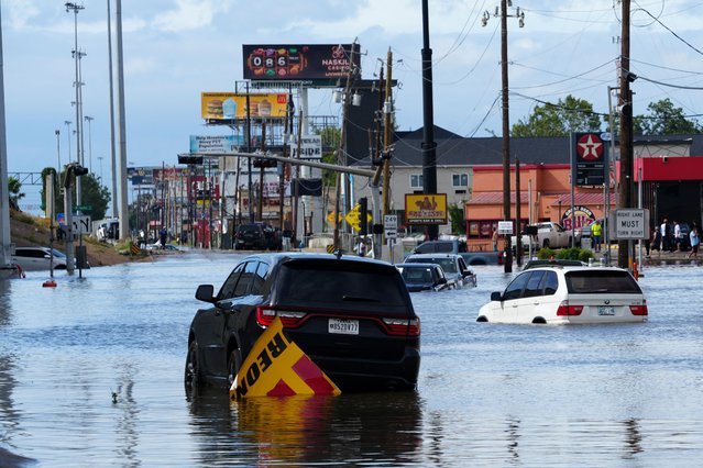 Cars are submerged in flood waters after Hurricane Beryl passed in Houston, Texas, U.S. July 8, 2024. (Photo by Rich Matthews/Reuters)