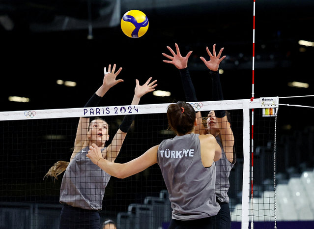 Athletes from Turkey's volley ball team during training in Paris on July 25, 2024. (Photo by Siphiwe Sibeko/Reuters)