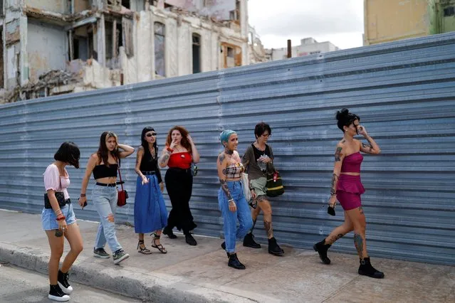 Women with tattoos walk in Havana, Cuba, February 27, 2022. (Photo by Amanda Perobelli/Reuters)