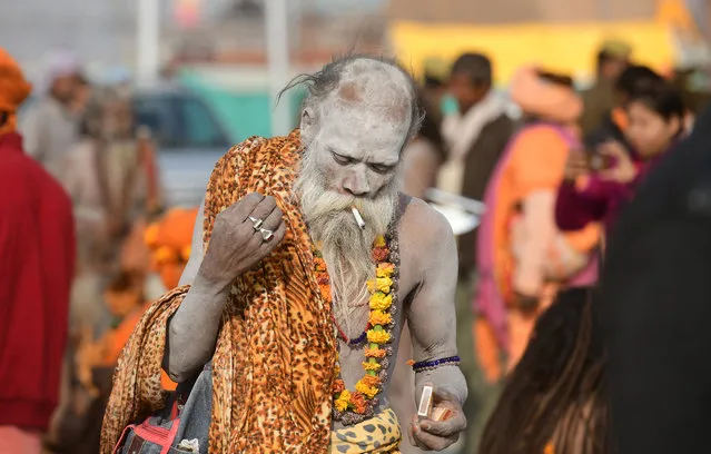 Indian Hindu sadhus (holy men) from the Juna Akhara take part in a religious procession  towards Sangam area, during the first “royal entry” for the Kumbh Mela in Allahabad on December 25, 2018. (Photo by Sanjay Kanojia/AFP Photo)