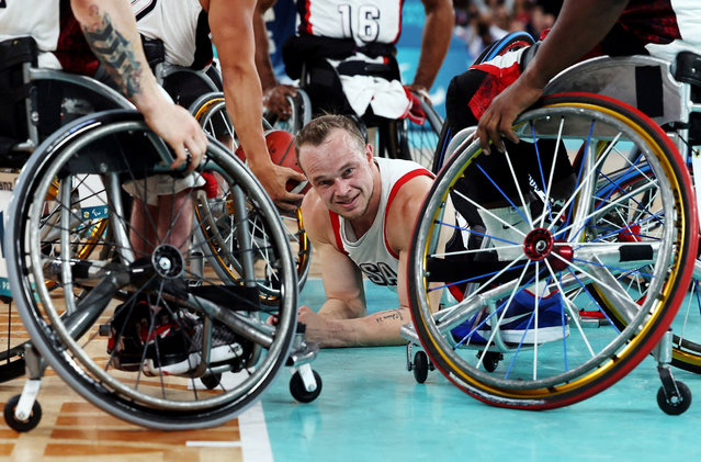 John Boie of United States reacts on the floor during the men's wheelchair basketball quarterfinals at the Paris Paralympics on September 3, 2024. (Photo by Umit Bektas/Reuters)