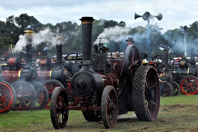 Participants line up their steamers during a vintage steam rally organised by the Irish Steam Preservation Society, in Stradbally, Ireland on August 7, 2023. (Photo by Clodagh Kilcoyne/Reuters)