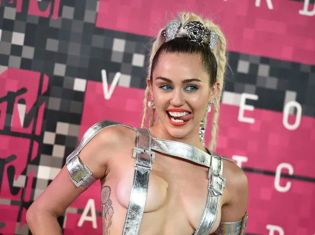 Miley Cyrus arrives at the MTV Video Music Awards at the Microsoft Theater on Sunday, August 30, 2015, in Los Angeles. (Photo by Jordan Strauss/Invision/AP Photo)