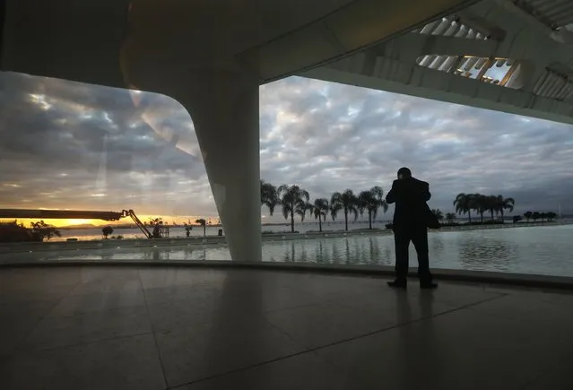 A man stands at the Museum of Tomorrow, in the renovated port district, an area aiming to attract tourists, on August 23, 2017 in Rio de Janeiro, Brazil. Rio de Janeiro's hotels have reported a fifty percent drop in expected reservations for the upcoming New Year's and Carnival holidays. Factors include the economic crisis in Brazil, a spike in urban crime and violence and an expanded number of hotel rooms constructed in the run up to the Olympics. (Photo by Mario Tama/Getty Images)