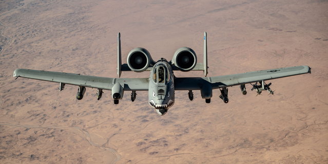 A U.S. Air Force A-10 Thunderbolt II flies a routine mission over the U.S. Central Command area of responsibility January 9, 2025. A fearsome A-10 “Warthog” U.S warplane is seen conducting a show of force. An Air Force KC-135 Stratotanker offloaded fuel to the Thunderbolt II during a presence patrol over the U.S. Central Command area of responsibility on 9 January. The pictures were taken in an undisclosed location, with the area of responsibility (AOR) spaning across the Middle East, Central Asia, and parts of South Asia. KC-135 Stratotankers maintain a constant presence in the AOR, refueling U.S. and coalition aircraft and “preserving regional security relationships”, say the U.S. Air Force. (Photo by Jackson Manske/USAF/South West News Service)