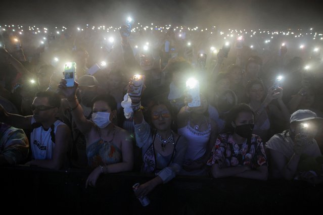 Fans watch Ty Dolla $ign perform at the Coachella Valley Music and Arts Festival in Indio, California, on April 13, 2025. (Photo by Daniel Cole/Reuters)