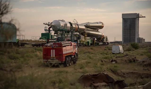 The Soyuz MS-01 spacecraft is rolled out by train to the launch pad at the Baikonur Cosmodrome, Kazakhstan, Monday, July 4, 2016. NASA astronaut Kate Rubins, cosmonaut Anatoly Ivanishin of the Russian space agency Roscosmos, and astronaut Takuya Onishi of the Japan Aerospace Exploration Agency (JAXA) will launch from the Baikonur Cosmodrome in Kazakhstan the morning of July 7, Kazakh time (July 6 Eastern time.) All three will spend approximately four months on the orbital complex, returning to Earth in October. (Photo by Bill Ingalls/NASA)