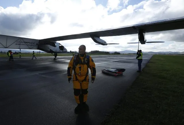 Swiss pilot Bertrand Piccard prepares for a test flight of the solar-powered Solar Impulse 2 experimental aircraft in Payerne November 13, 2014. (Photo by Ruben Sprich/Reuters)
