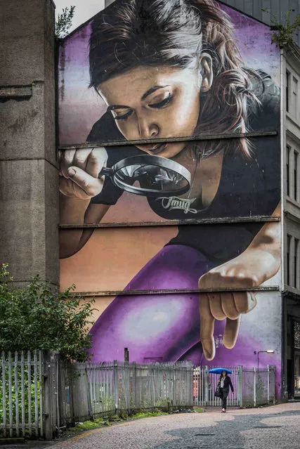 Got You, Glasgow. Urban Life category winner. “This large mural is part of the Glasgow city centre mural trail. It was taken in June 2017. I was looking to create a composition where the mural was interacting with someone or something in the alleyway. I stood in a small doorway for some time, waiting for the right person to come past. Fortunately, it started raining and a lady with her umbrella suddenly appeared to create the image I was looking for”. (Photo by George Robertson/UK Landscape Photographer of the Year 2020)