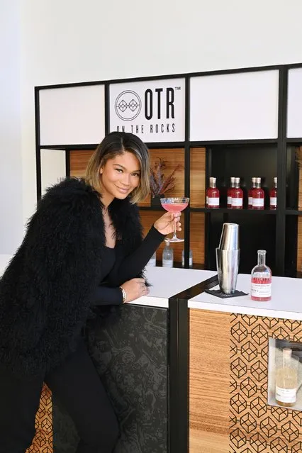 American model who has worked as a Victoria's Secret Angel Chanel Iman enjoying an OTR Premium Cocktail between shows at NYFW: The Shows 2023 at Spring Studios on February 11, 2023 in New York City. (Photo by Bryan Bedder/Getty Images for IMG Fashion)