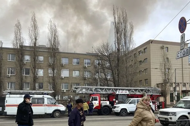 Smoke rises from a Russian Federal Security Service building in Rostov-on-Don, Russia, Thursday, March 16, 2023. A building used by Russia's Federal Security Service, or the FSB, caught fire on Thursday in the southern city of Rostov, some 70 kilometers (43 miles) from the border with Ukraine. Russian state media reported that one person died and two were wounded, citing local emergency services and noting that the building belonged to the FSB's regional border patrol section. (Photo by AP Photo/Stringer)