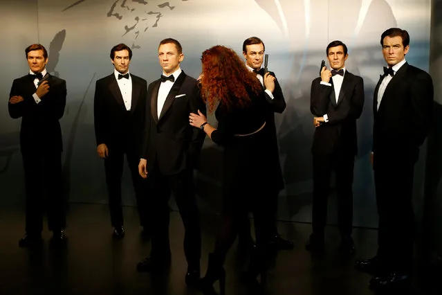 Wax figures of all 6 actors who portrayed James Bond character, Roger Moore, Timothy Dalton, Daniel Craig, Sean Connery, George Lazenby and Pierce Brosnan (L-R) are seen in the Madame Tussauds wax museum in Berlin, Germany October 4, 2016. (Photo by Axel Schmidt/Reuters)