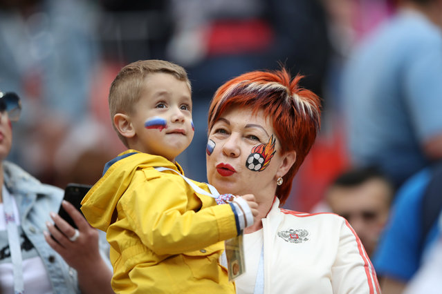 Russia fans with face paint before the Russia 2018 World Cup Group A football match between Russia and Saudi Arabia at the Luzhniki Stadium in Moscow on June 14, 2018. (Photo by Carl Recine/Reuters)
