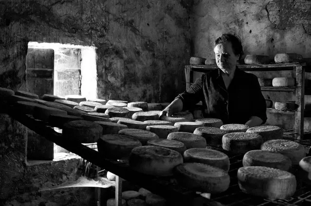 “Say traditional cheese”. Up in the mountains, in a small village of Crete, Mrs Kalliopi keeps the tradition of making cheese alive. Time seems to stand still in this place to remind us how people worked and produced things without the means of technology. This is an old room made of stones, where cheese is preserved and matured in what they call “cage conditions”. Location: Geraki Crete Greece. (Photo and caption by Stella Meligounaki/National Geographic Traveler Photo Contest)