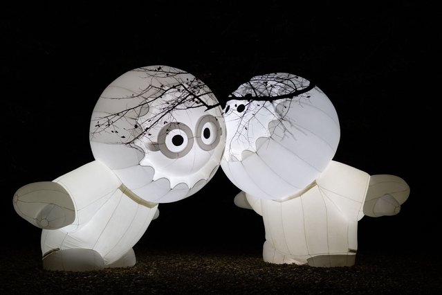 This photograph taken on December 4, 2024 shows the “Anooki” created by Moetu Batlle et David Passegand displayed in the Parc de la Tete d'Or during the preview of the annual edition of the Festival of Lights (Fete des Lumieres) in Lyon, central-eastern France. The Festival of Lights (Fete des Lumieres) is marked each year on December 8, since 1852, on the Feast of the Immaculate Conception, after the city was spared by the plague of 1643. (Photo by Alex Martin/AFP Photo)