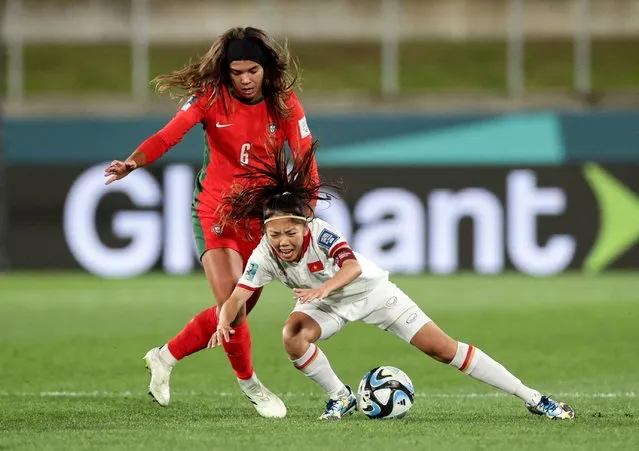 Huynh Nhu of Vietnam is challenged by Andreia Jacinto of Portugal during the FIFA Women's World Cup Australia & New Zealand 2023 Group E match between Portugal and Vietnam at Waikato Stadium on July 27, 2023 in Hamilton / Kirikiriroa, New Zealand. (Photo by David Rowland/Reuters)
