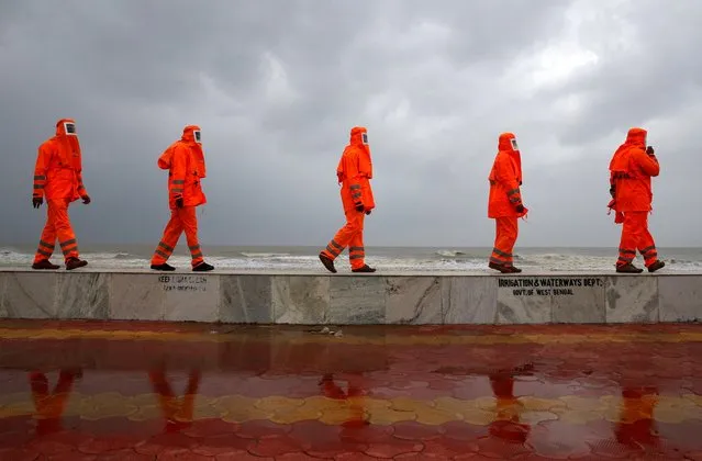 Members of the National Disaster Response Force (NDRF) patrol along a shore ahead of Cyclone Yaas in Digha in Purba Medinipur district in the eastern state of West Bengal, India, May 25, 2021. (Photo by Rupak De Chowdhuri/Reuters)