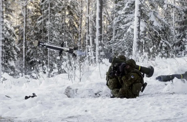 Estonian army soldiers attend the first live fire exercise of their new Javelin anti-tank missiles in Kuusalu, Estonia, January 22, 2016. (Photo by Ints Kalnins/Reuters)