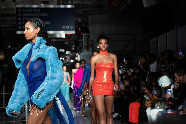 Models present creations by LaQuan Smith at the Intrepid during fashion week in Manhattan, New York City, U.S., September 12, 2022. (Photo by Caitlin Ochs/Reuters)