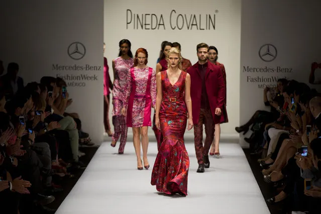 Models wear creations by Mexican fashion house Pineda Covalin during a runway show at Mercedes-Benz Fashion Week in Mexico City, Tuesday, April 14, 2015. (Photo by Rebecca Blackwell/AP Photo)