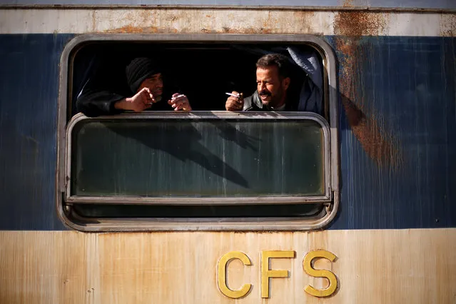 People ride a train at Baghdad Station in west Aleppo, Syria February 1, 2017. (Photo by Omar Sanadiki/Reuters)