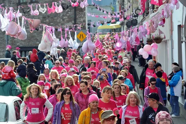 Walkers heading down Main Street at the start of the  Pink Ribbon walk in aid of the Irish Cancer Society and Action Breast Cancer in Kinsale, Co Cork, on March 2, 2014. (Photo by Dan Linehan/Irish Examiner News)