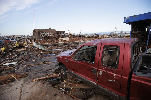 Heavy damage is seen downtown after a tornado swept through the area on December 11, 2021 in Mayfield, Kentucky. Multiple tornadoes tore through parts of the lower Midwest late on Friday night leaving a large path of destruction and unknown fatalities. (Photo by Brett Carlsen/Getty Images)