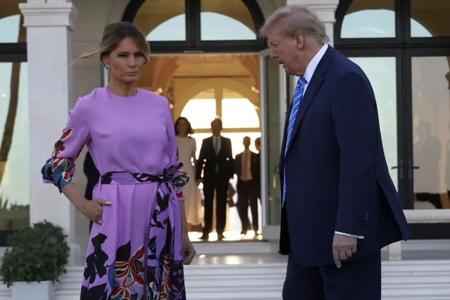 Republican presidential candidate, former US President Donald Trump and former first lady Melania Trump arrive at the home of billionaire investor John Paulson on April 6, 2024 in Palm Beach, Florida. Donald Trump's campaign is expecting to raise more than 40 million dollars when major donors gather a fundraiser billed as the “Inaugural Leadership Dinner”. (Photo by Alon Skuy/Getty Images)