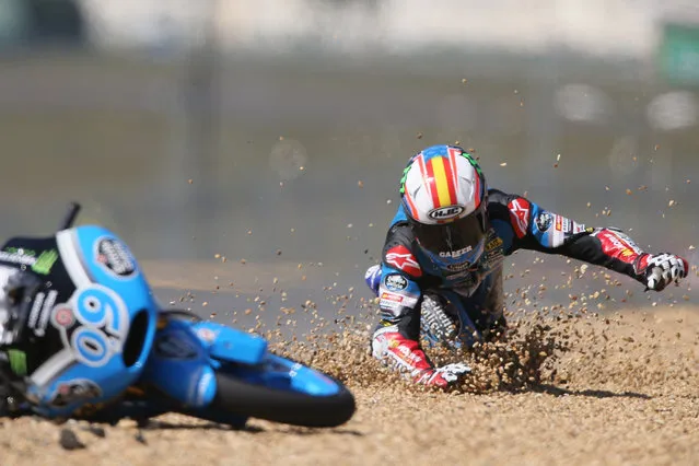 Spanish Moto 3 rider Joreg Navarro fall down during the France Motorcycle Grand Prix race at the Bugatti race track in Le Mans, western France, Sunday, May 17, 2015. (Photo by David Vincent/AP Photo)