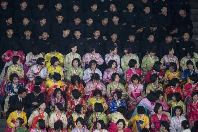 Spectators watch figure skaters perform at the Paektusan Prize International Figure Skating Festival in Pyongyang on February 15, 2017. The Paektusan Prize International Figure Skating Festival is held every year to celebrate Kim Jong- Il, the leader who oversaw the North' s first nuclear tests. (Photo by Ed Jones/AFP Photo)