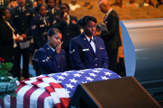 Members of the U.S. Air Force react as they pay their respect at the casket of U.S. Airman Roger Fortson during his funeral service in Stonecrest, Georgia, on May 17, 2024. (Photo by Alyssa Pointer/Reuters)
