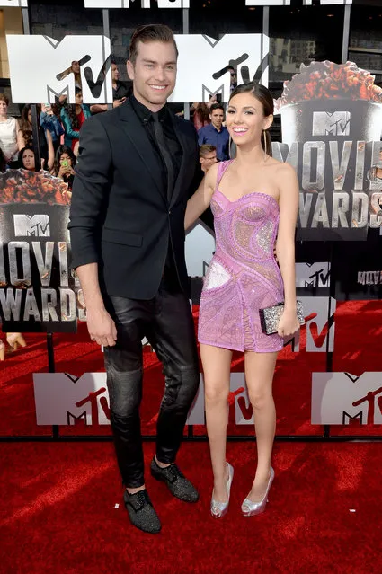 Actors Pierson Fode (L) and Victoria Justice attend the 2014 MTV Movie Awards at Nokia Theatre L.A. Live on April 13, 2014 in Los Angeles, California. (Photo by Michael Buckner/Getty Images)