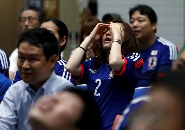 Japan's soccer fans react after England's Fara Williams scored an equalizer during their FIFA Women's World Cup semi-final soccer match, at a public viewing event in Tokyo, Japan, July 2, 2015. (Photo by Yuya Shino/Reuters)