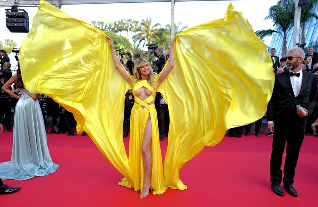 German model Heidi Klum arrives for the screening of the film “La Passion de Dodin Bouffant” (The Pot au Feu) during the 76th edition of the Cannes Film Festival in Cannes, southern France, on May 24, 2023. (Photo by Valery Hache/AFP Photo)