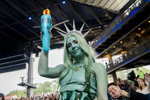Megan Bosisio, 28, dresses in a Chapell Roan inspired Statue of Liberty costume during the All Things Go festival in Columbia, Maryland, on September 29, 2024. (Photo by Allison Robbert for The Washington Post)
