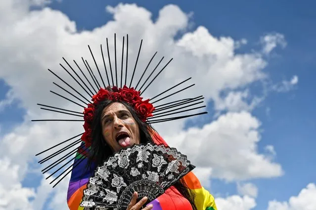 A participant takes part in a Pride Parade in Pristina, on June 9, 2022. Members of the LGBTQ community took part in a Pride Parade in Pristina to demand “freedom” and “equal rights” in Kosovo's largely conservative society. (Photo by Armend Nimani/AFP Photo)