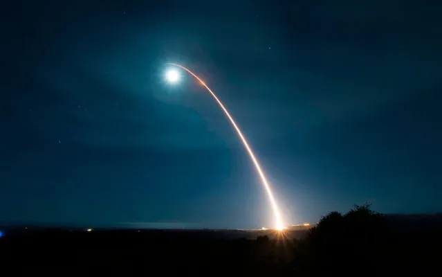 This US Air Force photo shows an unarmed Minuteman III intercontinental ballistic missile as it launches during a developmental test at 12:33 a.m. Pacific Time on February 5, 2020, at Vandenberg Air Force Base, California. The United States on February 5, 2020 tested an unarmed Minuteman III intercontinental ballistic missile with a new kind of re-entry vehicle as it seeks to modernize aging surface-to-air weapons. The missile was launched at 0830 GMT from Vandenberg Air Force Base in California, soaring 4,200 miles (6,700 km) across the Pacific to the Kwajalein atoll in the Marshall Islands, the air force said in a statement. (Photo by Clayton Wear/AFP Photo)