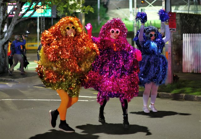 Spain fans dance outside the stadium before the semifinal match between Spain and Sweden during the Fifa Women’s World Cup Australia and New Zealand 2023 in Auckland, New Zealand on August 15, 2023. (Photo by Hannah McKay/Reuters)