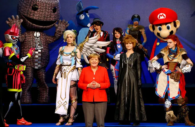 German Chancellor Angela Merkel opens the world's largest computer games fair Gamescom in Cologne, Germany, August 22, 2017. (Photo by Wolfgang Rattay/Reuters)